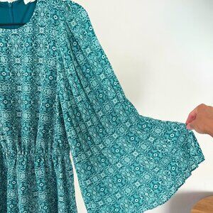 Mini jumpsuit with flare sleeves